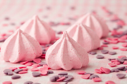 Close-up of delicious pink meringue. Studio shot.